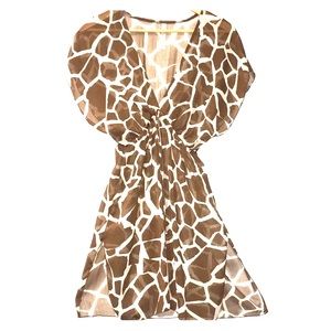 never worn! Sheer top, or bathing suit cover